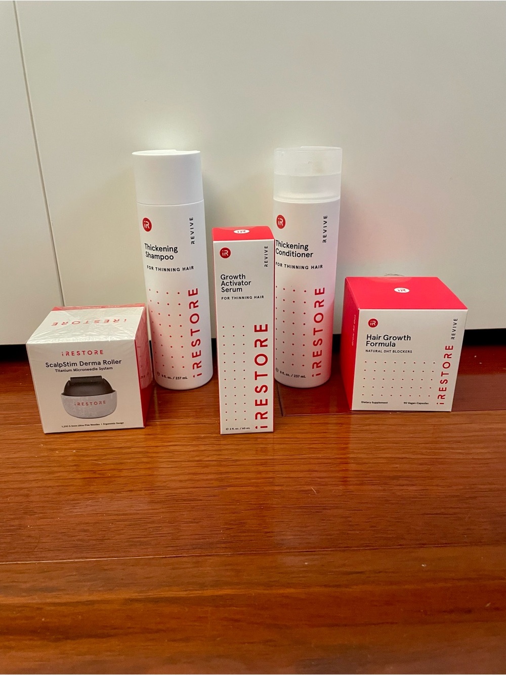 iRestore Shampoo and Conditioner set with serum, and derma roller